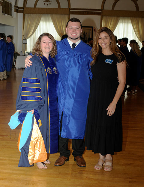 Aviation maintenance technician student Aaron Dylan McGarvey marks the special day with two of his many supporters: Dawn M. Dickey (left), director of disability and access resources, and Heidi E. Roupp, disability and access resources specialist/staff interpreter.
