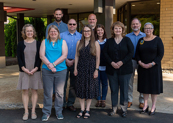 Nine faculty members, congratulated by the president, will begin the Fall 2022 semester at a higher academic rank.