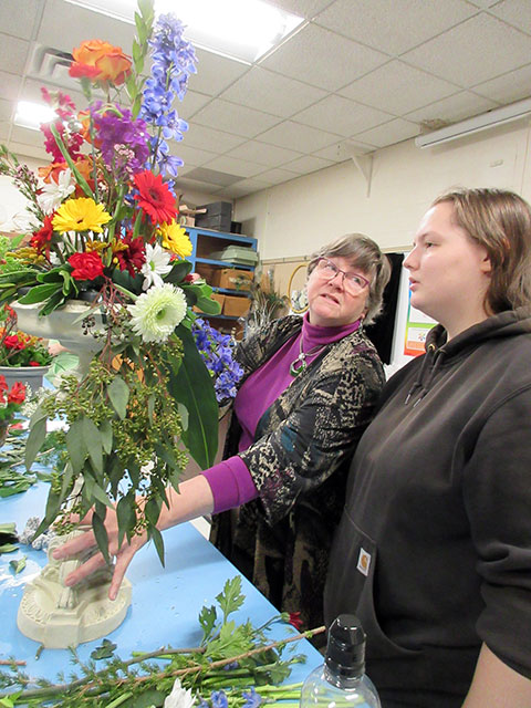 Ruhl and Josephina R. Hanzel, a baking & pastry arts student from Wellsville, confer on the latter's 