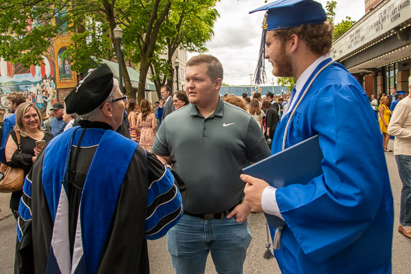 A junior seeks the opportunity to shake President Gilmour’s hand, since she is retiring before his commencement next year.