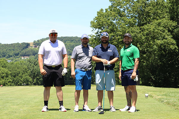 Club in hand, alumnus Aubrey Alexander (2009, business administration), anchors his team. Alexander is also a member of the foundation and of its Golf Classic Committee.