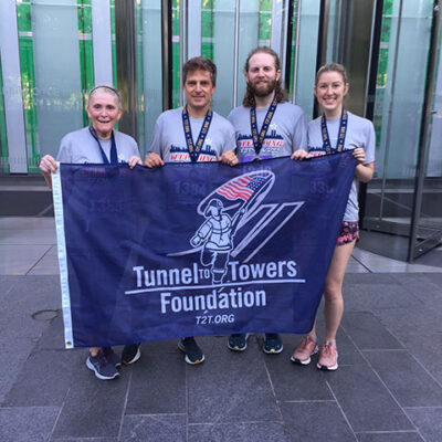 Members of Team Lewisburg/Williamsport (from left) – the Zimmermans, Bresticker and McCole – display a cause worth climbing for.
