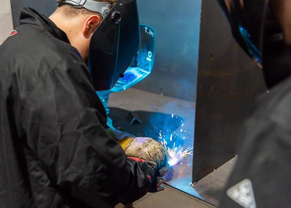 Learning travels full-circle, as items designed in a CAD lab earlier in the week are fabricated in the welding lab.