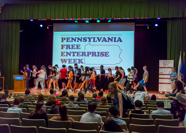 As students return to the ACC after lunch, an infectious playlist draws many to the stage for a 