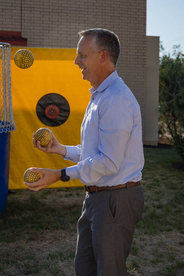 Prior to his ball toss at the benefit dunk tank, college President Michael J. Reed shows he can juggle much more than day-to-day responsibilities.