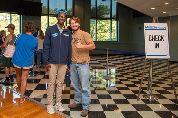 Making connections at check in! Connections Link Samir Pringle (left) and Tim Liam Brown meet in Penn’s Inn. Pringle is a second-year business management student from Philadelphia; Brown is a welding & fabrication engineering technology freshman from Collegeville.