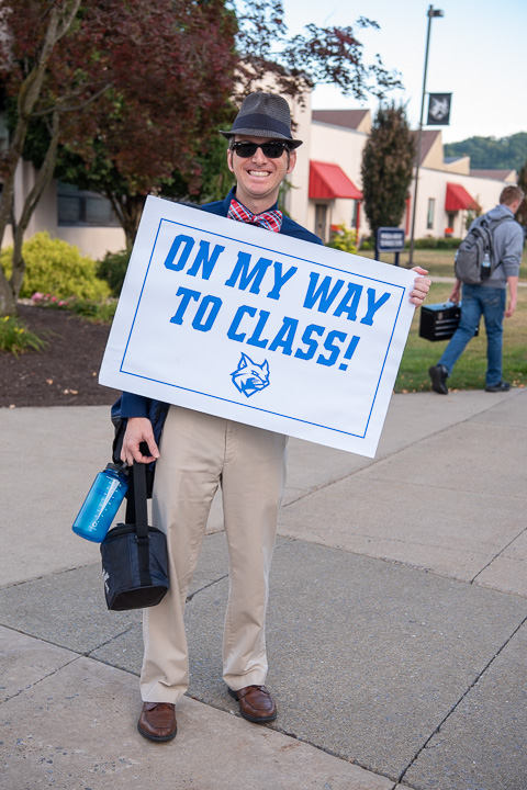 Embracing the first day of class – complete with lunch tote, water bottle and bow tie – is the ever-effervescent Bradley M. Webb, dean of engineering technologies.