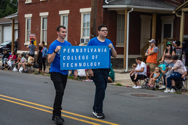 Making their allegiance known, Kadin M. Virkaitis (left), of Brentwood, N.H., and Thomas Panyik, of Columbia, spell it out in blue and white. Virkaitis is enrolled in aviation maintenance technology, while Panyik is pursuing a degree in welding & fabrication engineering technology.