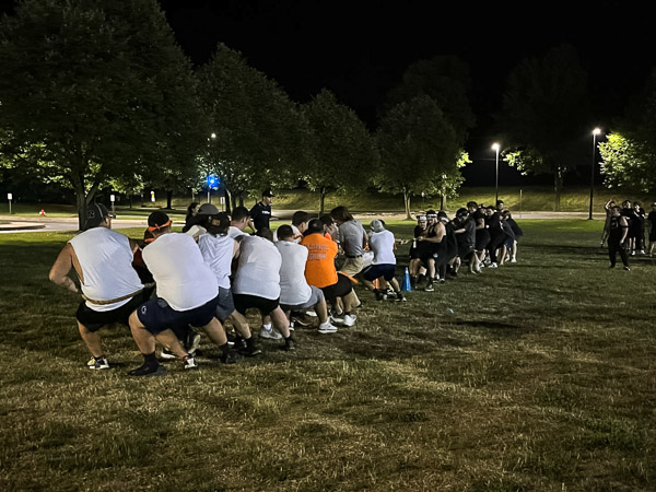 Mind and muscle meet in a tug of war near the Field House.
