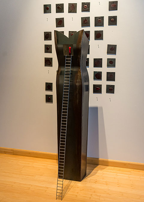 On exhibit in The Gallery at Penn College is Lynden Cline’s work, “Violations of the human spirit are never forgotten,” steel, wax, candle, 72” x 44” x 30”
