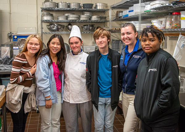 Wiest delivers the group to their next stop: a visit to the hospitality labs with Moira A. Smith, of Aaronsburg, who will graduate in December with an associate degree in baking & pastry arts.