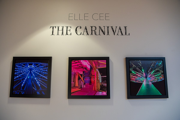 Carnival photographs are on display in the gallery lobby.