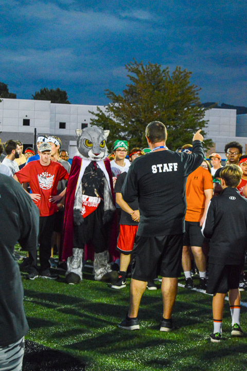 Jeremy R. Bottorf, coordinator of campus recreation, goes over the evening's rules with an eclectic group of student-athletes.