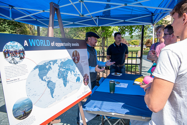 A world of opportunities, indeed! John F. Chappo (center), assistant professor of history/history of technology, and Naim N. Jabbour, assistant professor of architecture, share exciting study abroad options with students. 