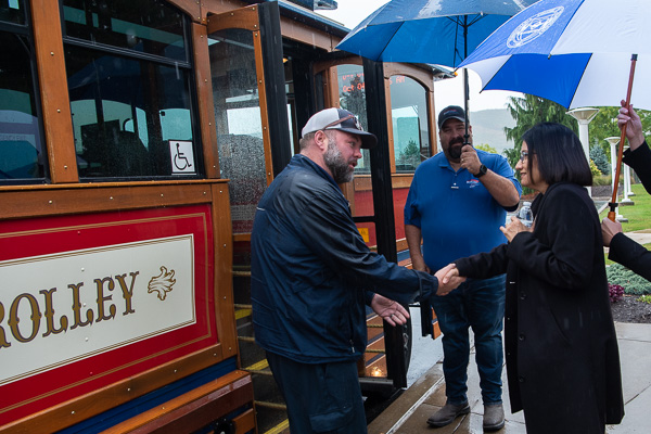 The day's drizzle was outmatched by the unstinting geniality of Bendapudi, greeting River Valley Transit employees before embarking on a trolley ride.
