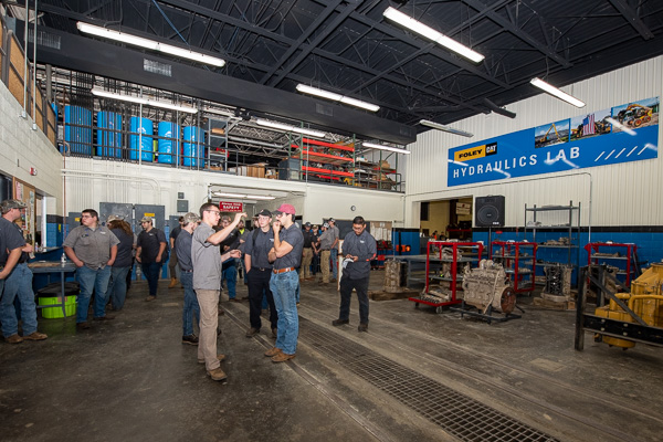 A crowd begins to gather prior to festivities in the Foley Hydraulics lab, already documenting the import of the occasion.