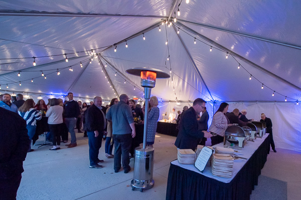 Under the tent – and under the lights – the fun continues. 