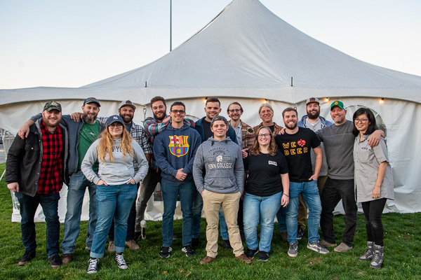And what's a tent party without a bunch of happy brewing alumni? Returning in full force (and bringing their brews, too) is this crew plus instructor Timothy L. Yarrington (fifth from right).