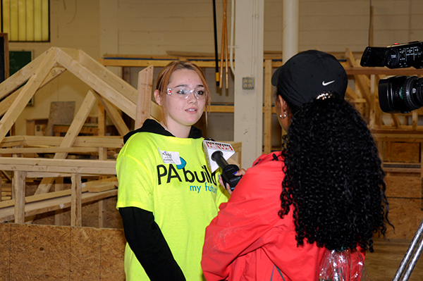Allen interviews a Williamsport Area High School student in the college's carpentry lab.