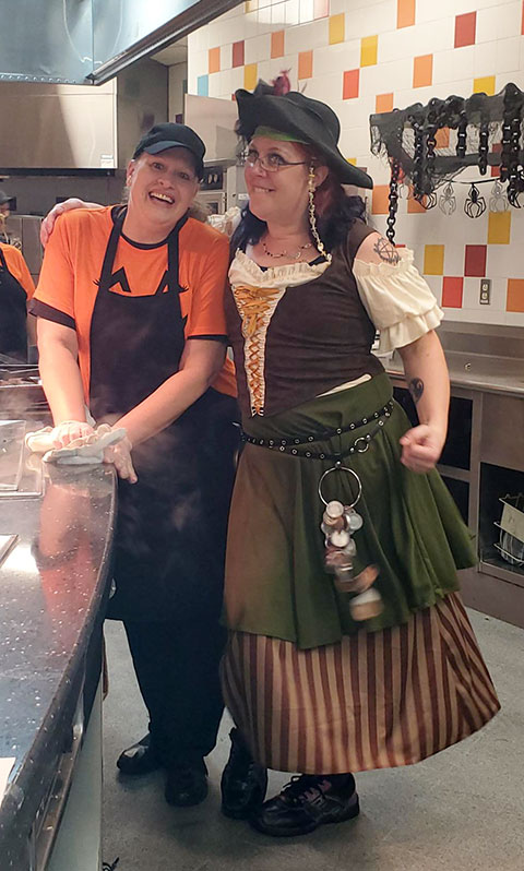 Dining Services workers Marcie J. Goodbrod (left) and Danielle L. Parker are ready to serve up some scares.