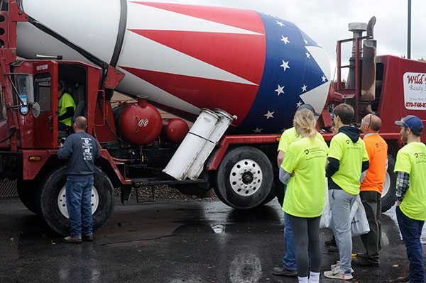A student gives a concrete truck a purposeful whirl under the supervision of Wild Rose Inc., a ready-mix business in Tioga and Jersey Shore.