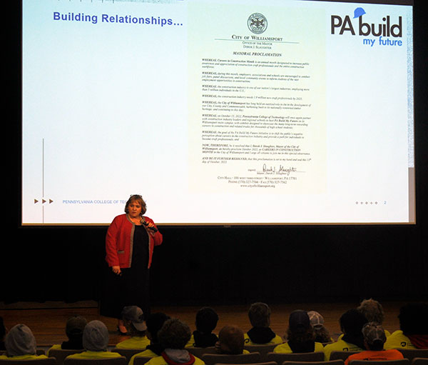 Ellyn A. Lester, assistant dean of construction and architectural technologies, shares a proclamation from Mayor Derek Slaughter during welcoming remarks in Klump Academic Center. The city leader declared October as Careers in Construction Month in Williamsport, and singled out 