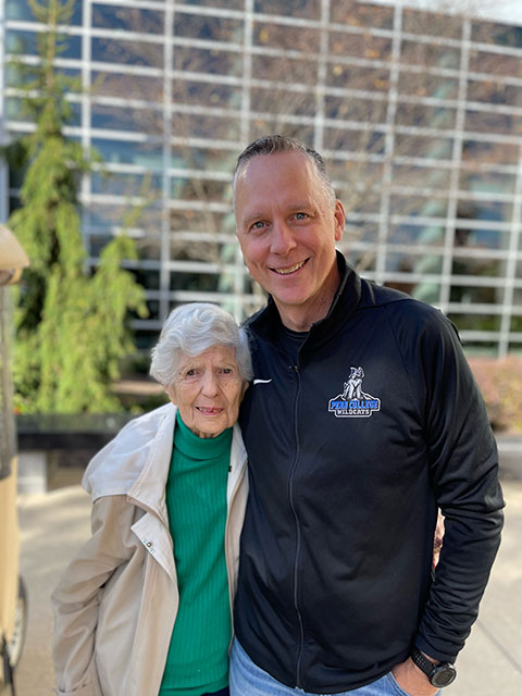 The family matriarch – Elizabeth Reed, "90 years young" – joins her son for a campus tour earlier in the day. The president's father, Elmer D. Reed Jr., died in September 2021. (Photo provided)