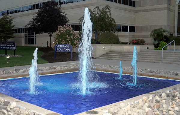 ... and the Veterans Fountain, annually dyed for the festive occasion.