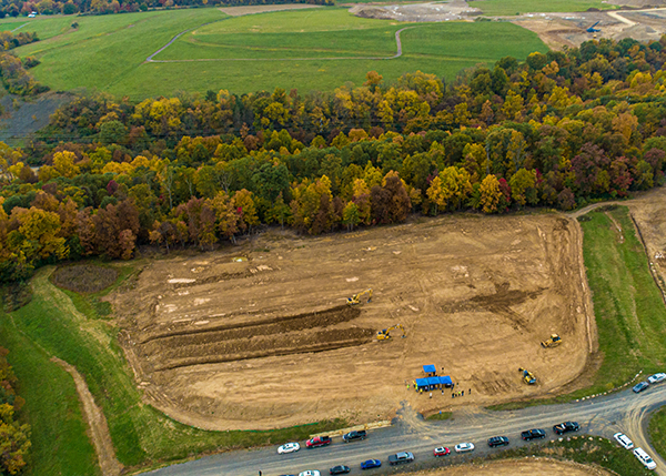 An aerial photo shows the newly named Allan Myers Field Site, providing vital hands-on experience to future equipment operators, bordered by the beauty of Penn's Woods. 