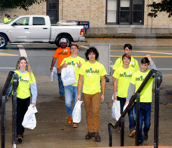 Changing into their T-shirts before even crossing West Third Street, and giving a thumbs-up review to the day's promise, students from Carbon Career & Technical Institute in Jim Thorpe begin their occupational odyssey.