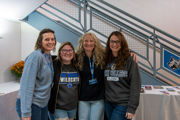 A welcoming bunch staffs a table in the Campus Center. From left: Danielle M. Liddic, employer and industry manager for Career Services; Presidential Student Ambassador Lauryn A. Stauffer; Erin S. Shultz, career events manager; and Stephanie A. Golder, an admissions counselor.