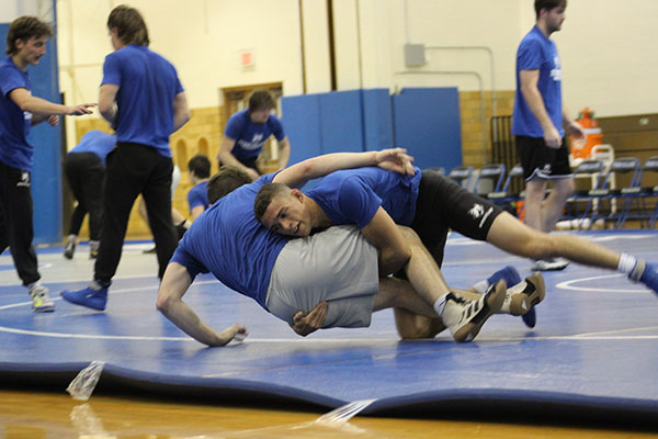 Spectators get a glimpse of action on the mat during Saturday's open practice. (Wrestling photos provided by coach Chander)