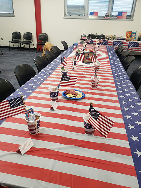 Flags, favors and food await those attending the second annual veterans luncheon at the Aviation Center. Also on the menu? Pulled pork prepared by Cordrey's husband, Wayne (also a veteran); meatballs; mac 'n' cheese; cole slaw, baked beans and pasta salad; Buffalo chicken dip; chips; bologna and cheese; and the aforementioned cupcakes. 