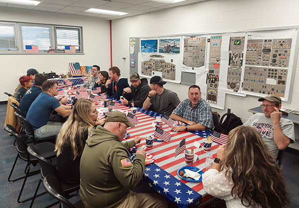 Students, faculty and staff break bread and enjoy the camaraderie ...