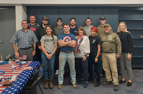 ... and gather for a portrait of selfless service to their grateful nation.