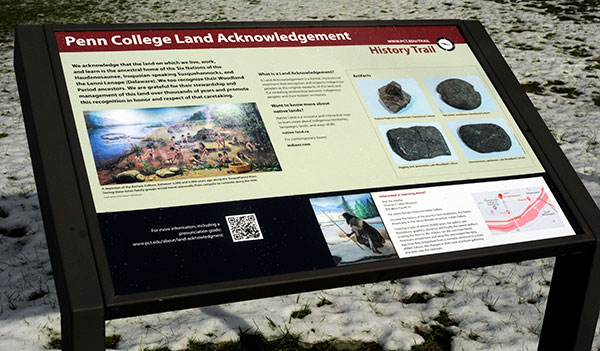 The Land Acknowledgement is now permanently displayed along the college's oft-traveled History Trail.