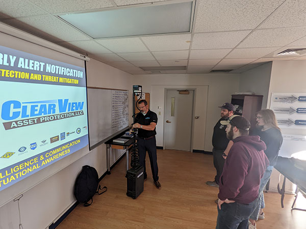 The president of ClearView Asset Protection LLC, a local veteran-owned business, talks with instructor William A. Schlosser's Technological Elements in Emergency Management class (BEM250). Lance Thomas’ presentation included ways that his company uses quickly deployable camera systems, coupled with artificial intelligence, to enhance security and safety. Students were able to examine the actual workings of the equipment and discuss beneficial instances involving Clearview’s products, including updated Amber Alerts and missing/endangered person alerts.