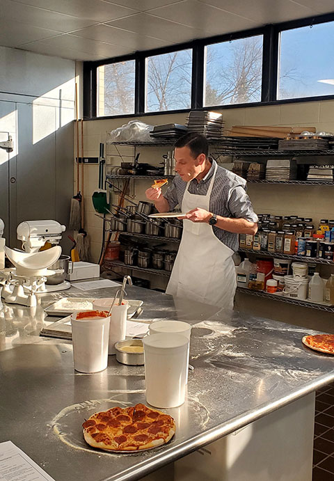 Jason K. Bogle, director of construction and planning, celebrates the finale of his latest project.