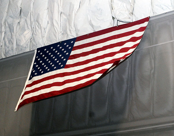 With the side door open for access to the food truck, Old Glory – an apt reminder of the occasion – ripples in the evening breeze. 