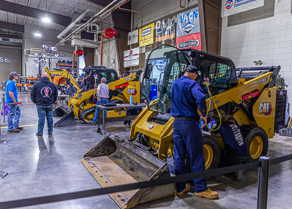 A fleet of Caterpillar equipment offers a challenge at the Air Conditioning station.