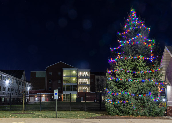 Campus housing glows, as well, silently telling a west-side story.