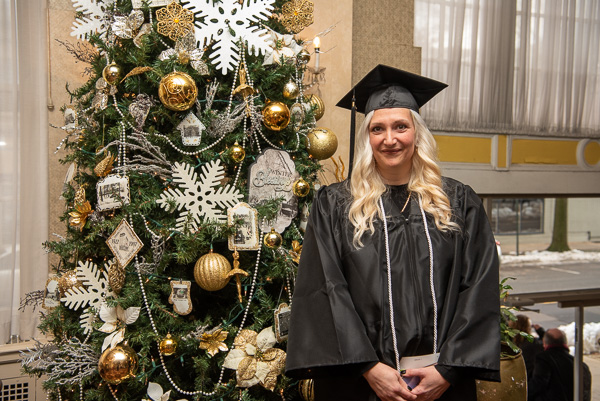 “Winter Blessings,” indeed! Kristen M. Mouissi, a financial aid specialist at the college and brand-new graduate in business administration: management concentration, adds to The Genetti Hotel's glitter.