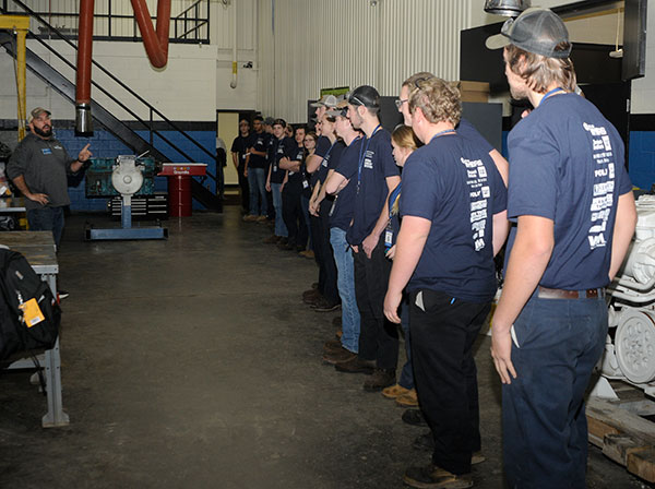 The competition field lines up, getting last-minute instructions and encouragement from co-chair John D. Motto, instructor of diesel equipment technology. Among the echoing takeaways: 