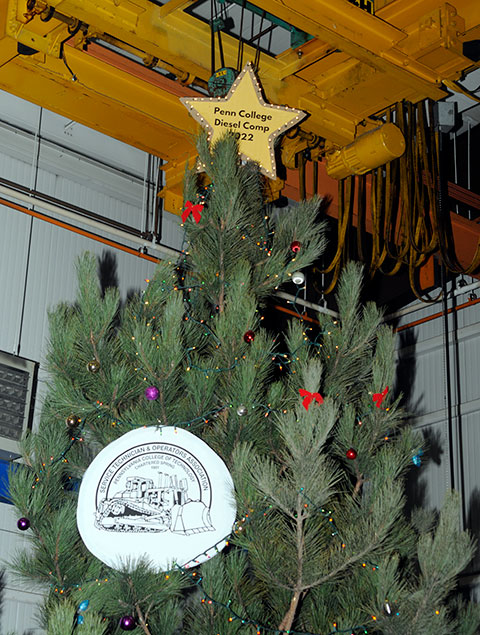 The Diesel Performance Club and Service Technicians & Operators Association joined forces to cut down and put up this floor-to-ceiling Christmas tree ...