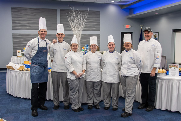 Students in the Grand Pastry Display class celebrate their culminating project with their chef instructors (from left): Chef Charles R. Niedermyer, instructor of baking and pastry arts/culinary arts; Caleb J. Stemler, of Jersey Shore; McKenna J. Morgan, of Mar Lin; Emily P. Jones, of Ephrata; Moira A. Smith, of Aaronsburg; Hannah L. Fleischer, of Lititz; and Chef Todd M. Keeley, assistant professor of baking and pastry arts/culinary arts.