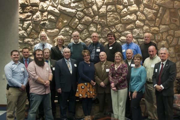 Wolfe (front row, sixth from right) was among those who returned to campus in October 2013 for the 50th anniversary of computer instruction at the college.