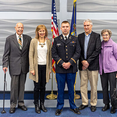 The newly commissioned officer marks the occasion with family: From left are grandfather Charles Schoffstall, mother Lori Norris, Cadet Norris, father David Norris and grandmother Louise Norris.