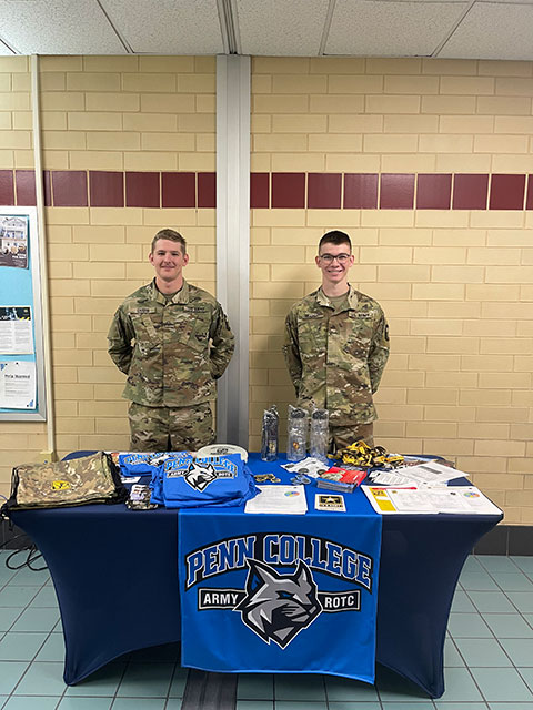 Cadets Drew R. Chapin (left) and Cameron A. Reaugh staff a Bush Campus Center recruitment table at one of Penn College's Open House events. Chapin, of Palymra, is a construction management student; Reaugh, of Blairsville, is enrolled in civil engineering technology.