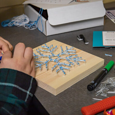Make-your-own-snowflake string art made for popular takeaways.
