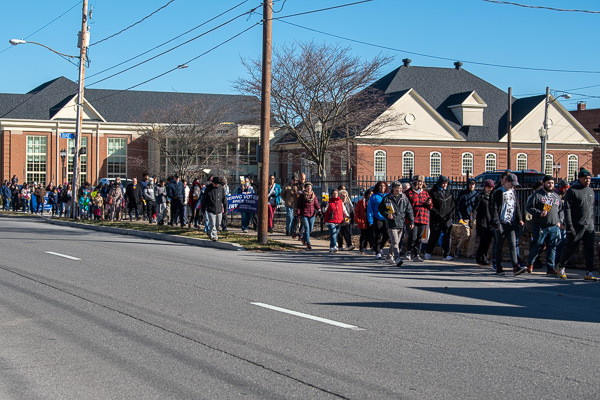 A long line of peacemakers travels from Lycoming College back toward the city’s center. 